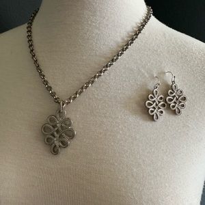 Etienne Aigner necklace and matching earrings.